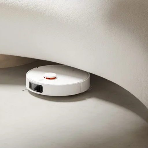Image of a robot vacuum cleaner cleaning under the sofa